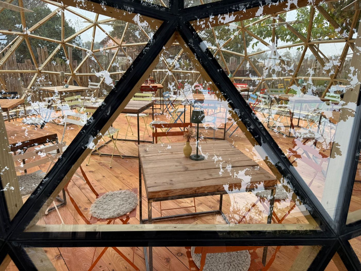 Interior seating seen through the multi-panel polycarbonate glazing